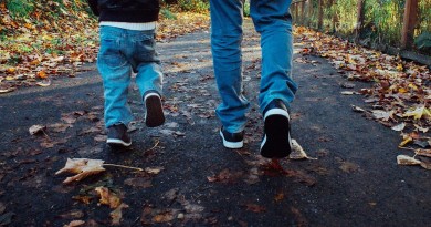 Man and boy walking